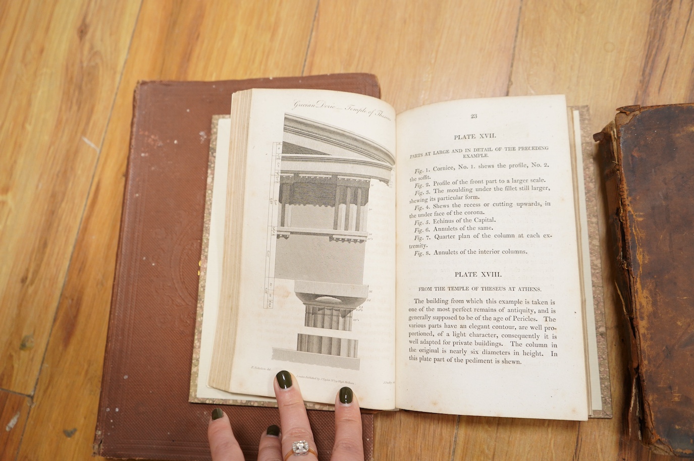 Three books to include The City and Country Complete Bricklayer by Batty Langley, The Students Instructor In Drawing and Working The Five Orders of Architecture by Peter Nicholson and Philips Select Atlas of Modern Geogr